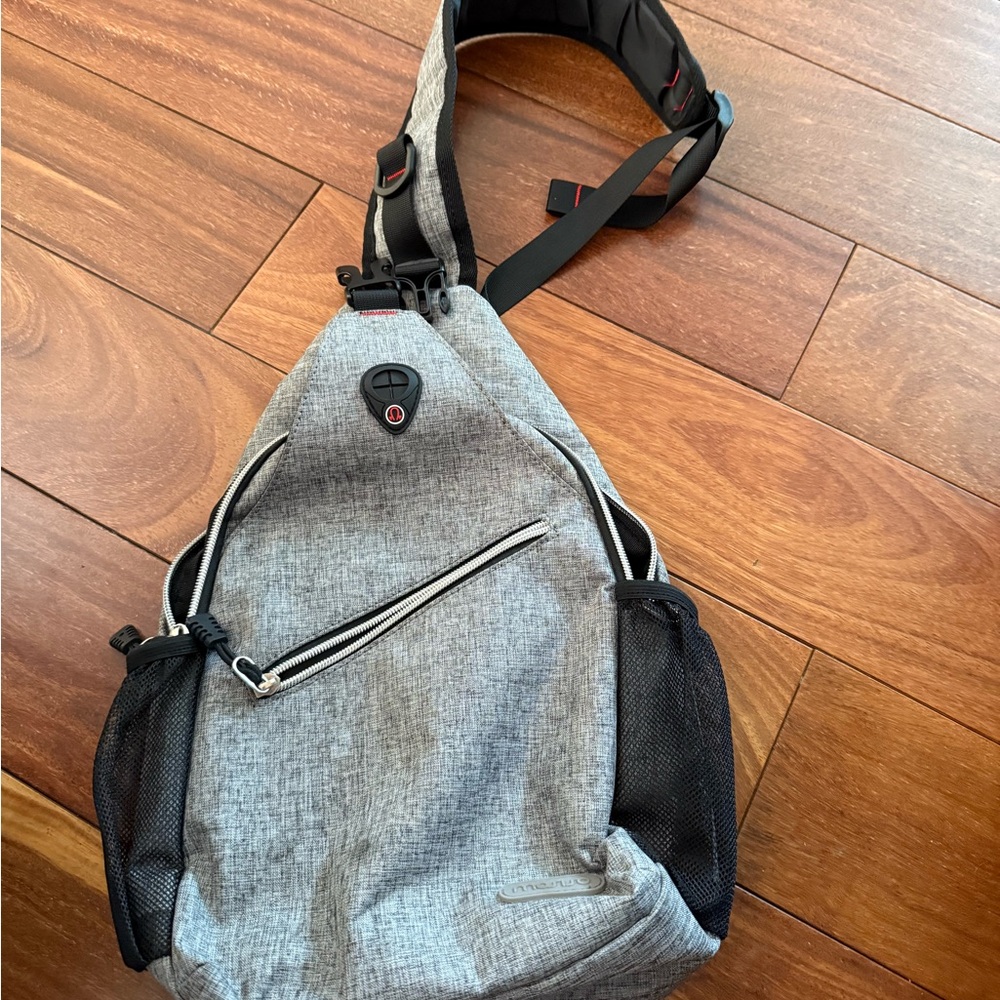 Gray and Black Backpack with Modern Structured Design